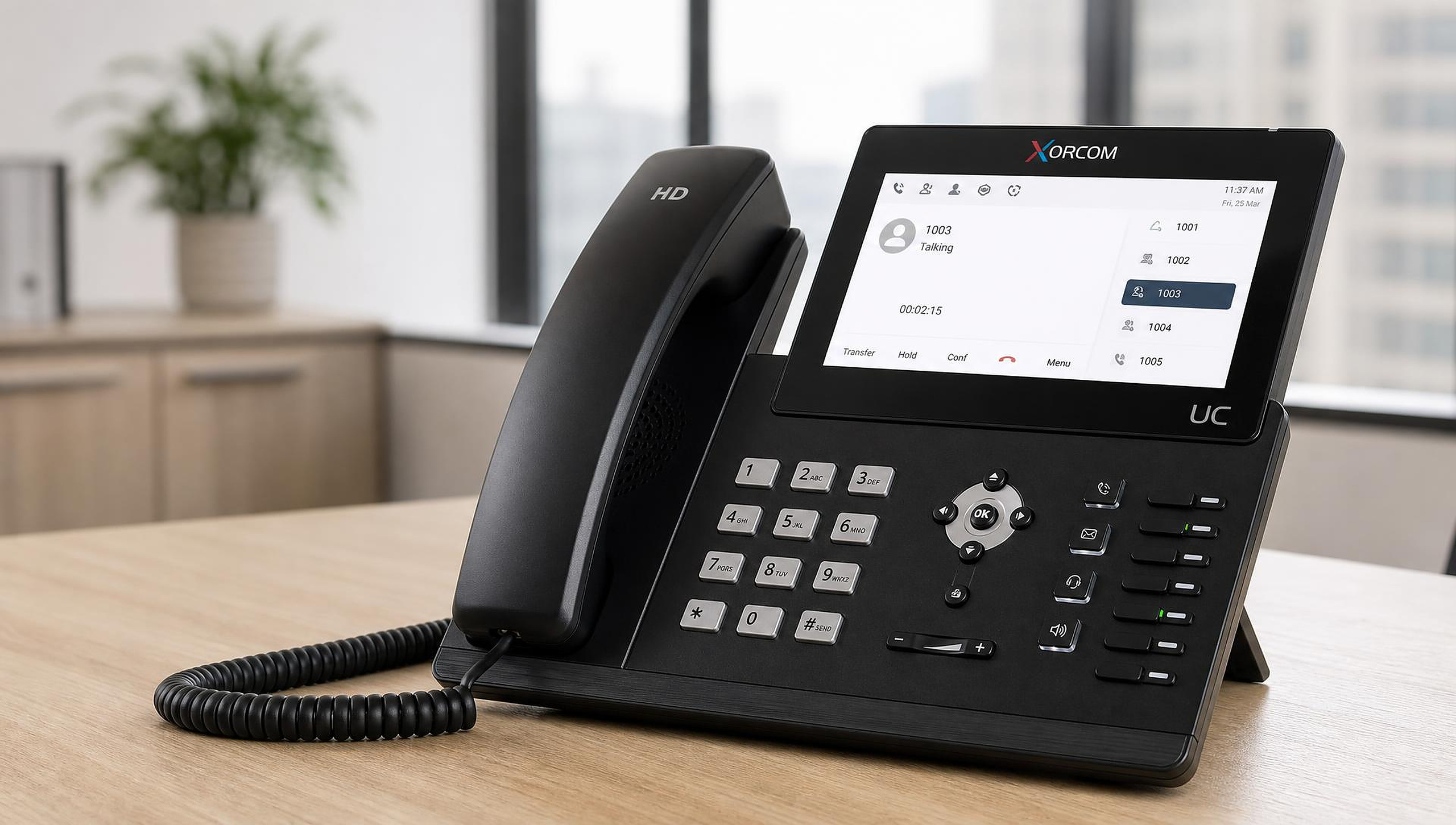 Xorcom UC series IP desk phone on a modern office desk